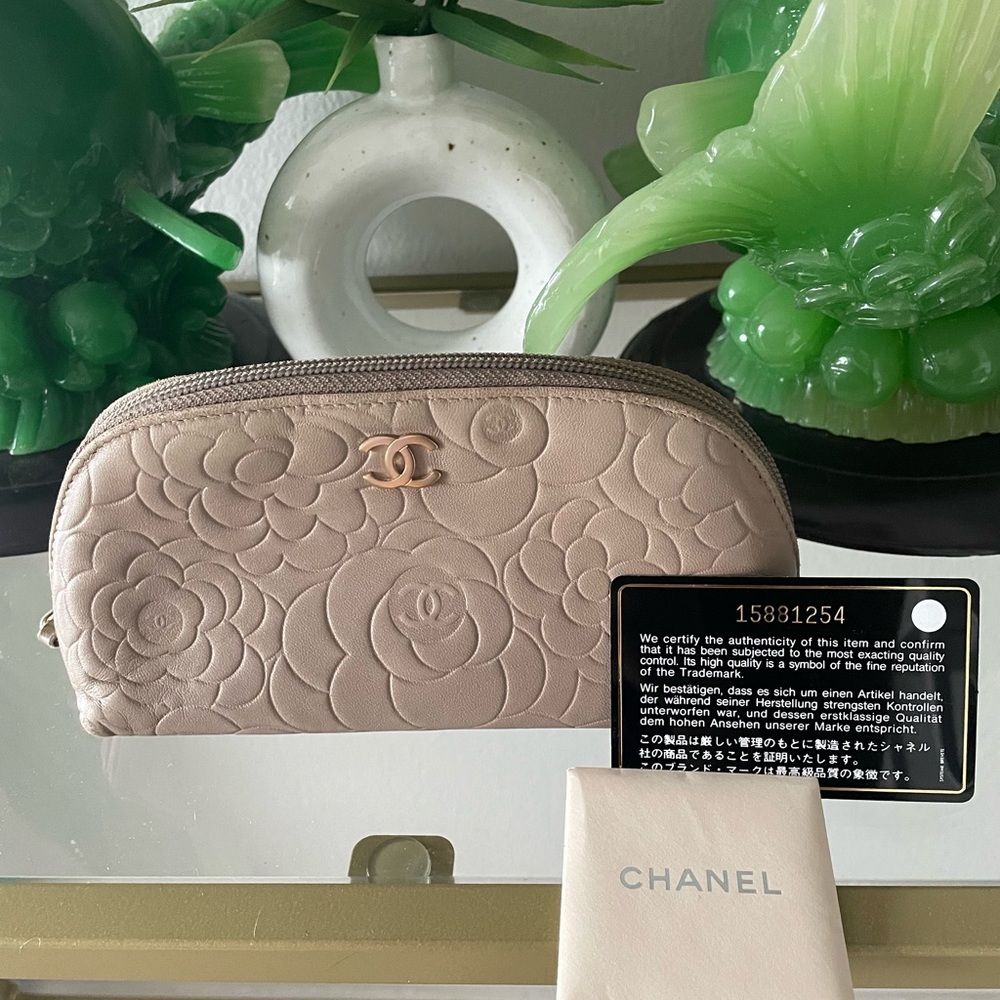SOLD / Authentic Chanel Camellia zippy pouch